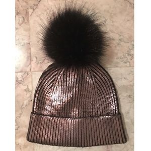 Bronze hat with faux fur pom pom